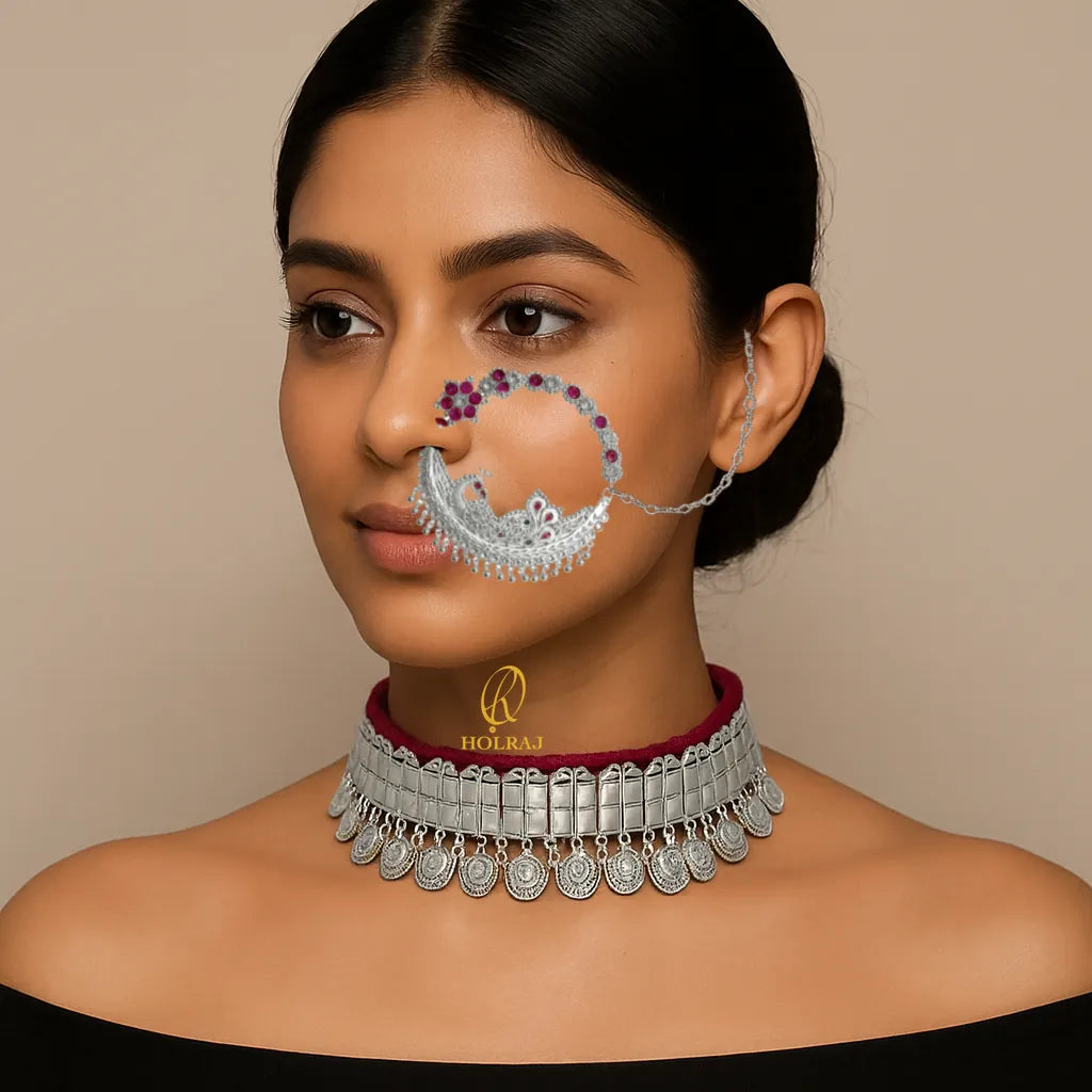 Woman wearing HOLRAJ branded 999 pure silver Morni Nosering / nath and galoband with a neutral background