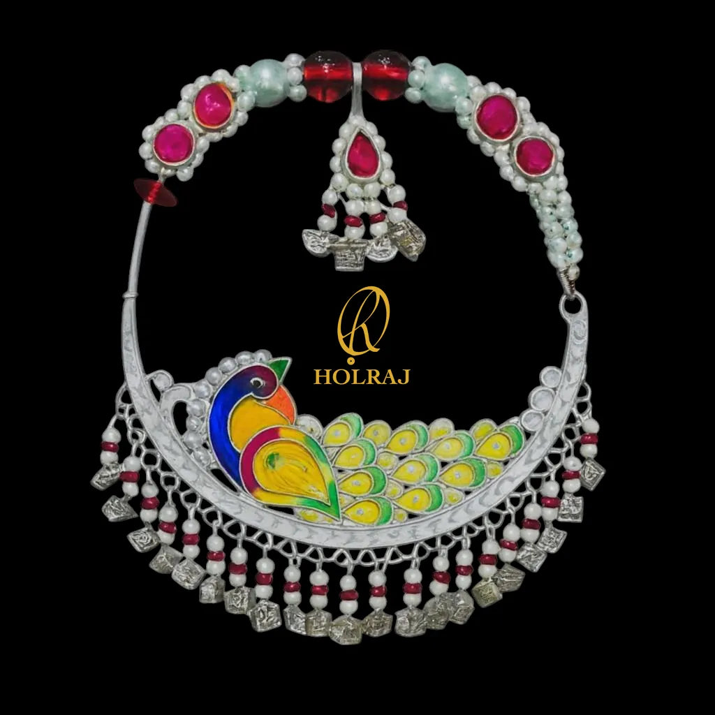 Holraj branded Peacock Tehri Nath – handcrafted BIS Hallmarked 999 pure silver nosering with colorful peacock enamel and beads, inspired by Uttarakhand’s bridal jewelry against a black background.