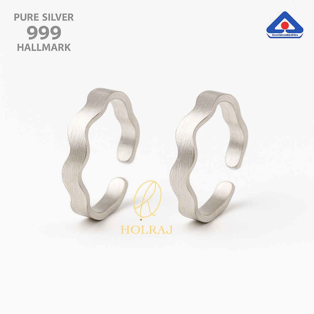 A pair of pure silver wavy toe rings with a brushed matte finish, open-ended for adjustable wear.