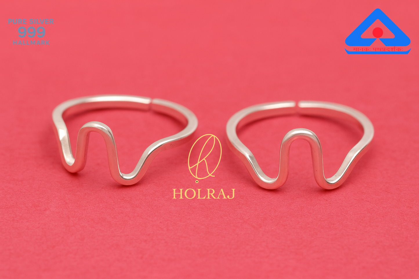 Two 999 silver Toe ring designs on a red background with 'HOLRAJ' branding.