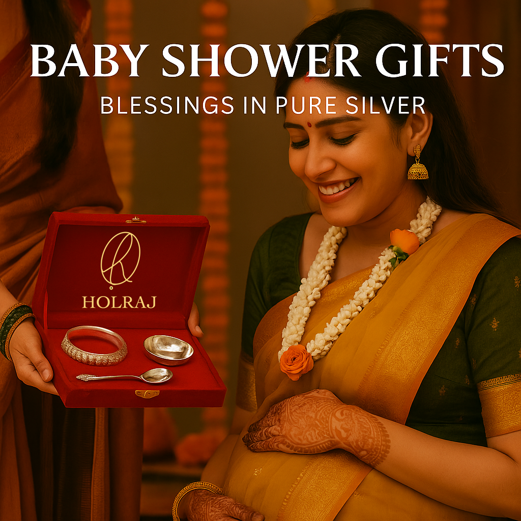 Smiling pregnant woman in a yellow saree receives a red velvet box with pure silver gifts during a traditional Indian baby shower. Text reads “BABY SHOWER GIFTS – BLESSINGS IN PURE SILVER.” Marigold garlands and festive decor glow in the background.