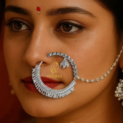 Close-up of a woman wearing a Holraj branded 999 pure silver Aarti Nath nose ring.