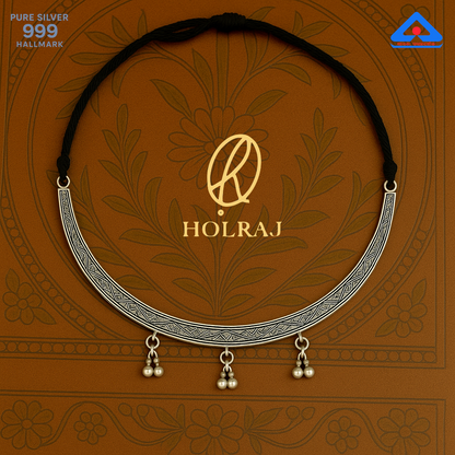 Chandrika Hansuli geometric engraved pure 999 silver necklace with ghungroos and black adjustable thread by Holraj.