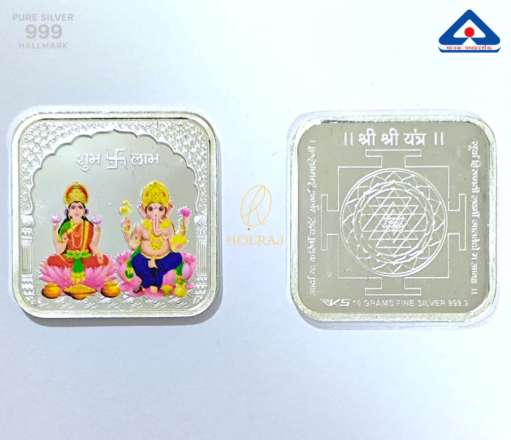 Square shaped BIS Hallmarked 999 silver coin with color enameled Lakshmi-Ganesha on one side and engraved Shree Yantra on the other, against a light blue background by HOLRAJ