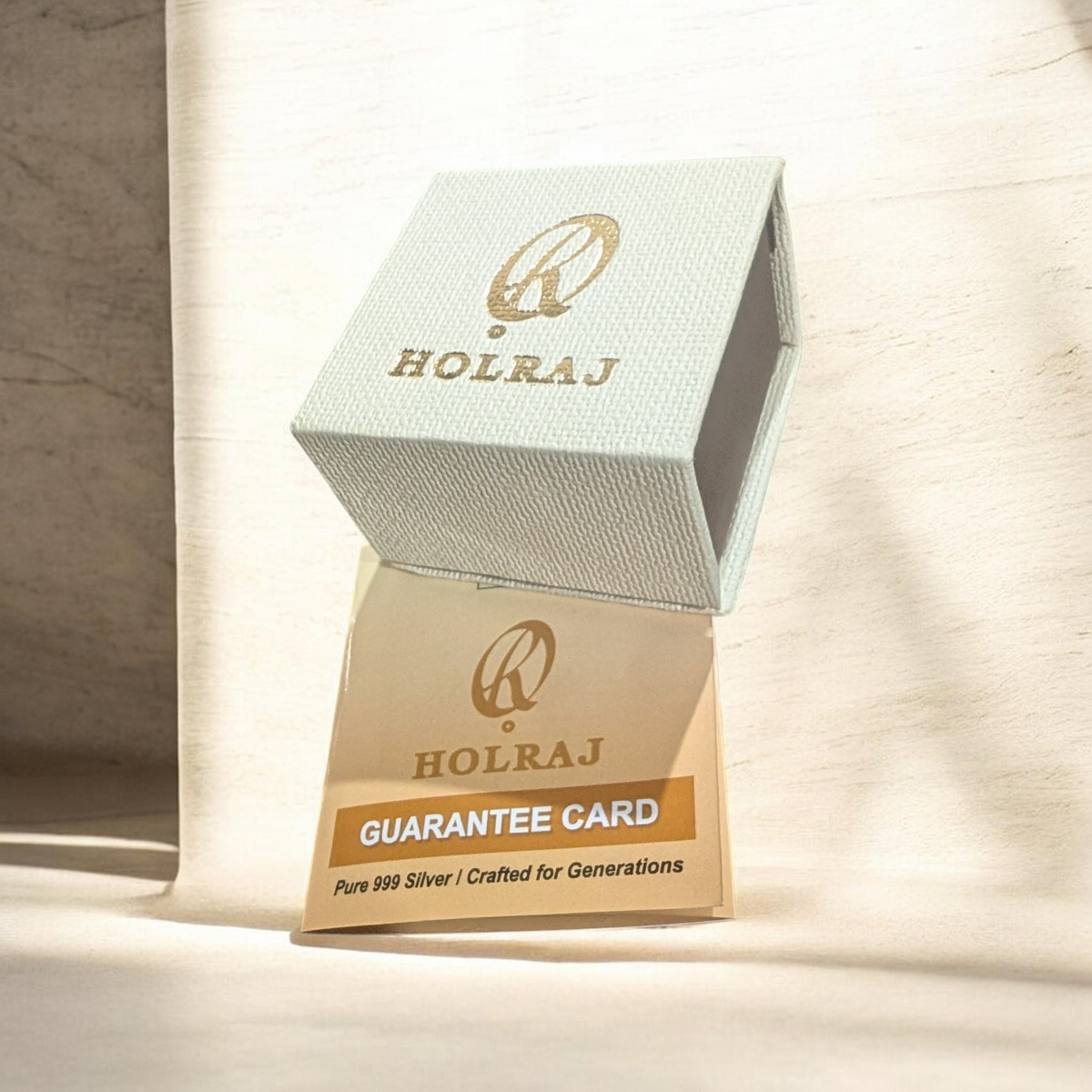 Holraj Ring Box along with an official document from the manufacturer certifying and assuring the purity. 
