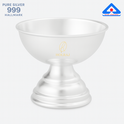 A handcrafted 999 silver diya with a flared base and polished finish, sized 1.5 x 1.5 inches, weighing 20 grams