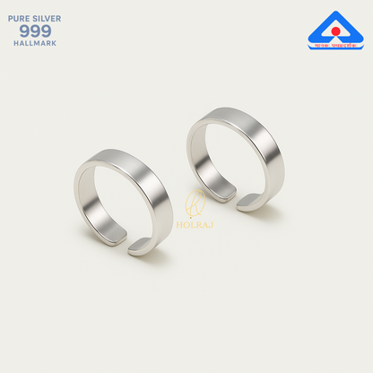 Two silver toe rings on a white background with 'HOLRAJ' branding.