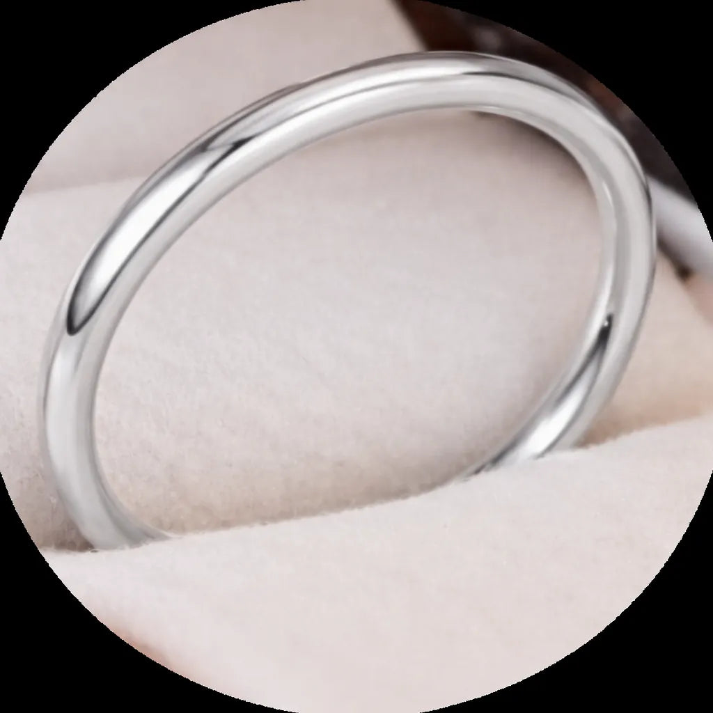 Close-up of RajSutra, Holraj’s minimal plain band ring crafted in 99.9% pure silver, designed for everyday wear with a smooth, round profile for comfort.
