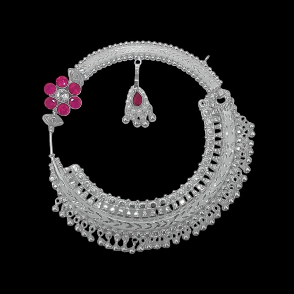 Holraj branded 999 pure silver Nath nose ring on a black background