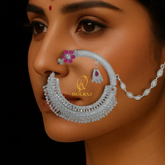 Close-up of a woman's face with HOLRAJ branded 999 pure silver Shivani Nath nose ring.