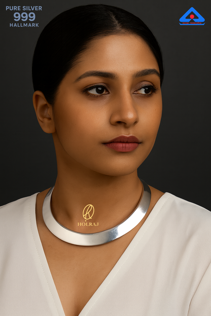 Woman wearing Shuddh Hansuli Majesty – 999 pure silver statement choker necklace with high-polish finish by Holraj.