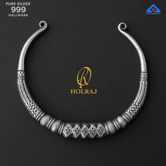 Pure 999 silver tribal Hansuli choker with engraved details, with 'HOLRAJ' logo on a dark background