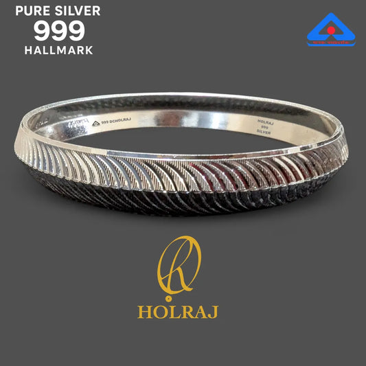 999 Hallmarked Silver Kada for men with 'HOLRAJ' branding on a dark background